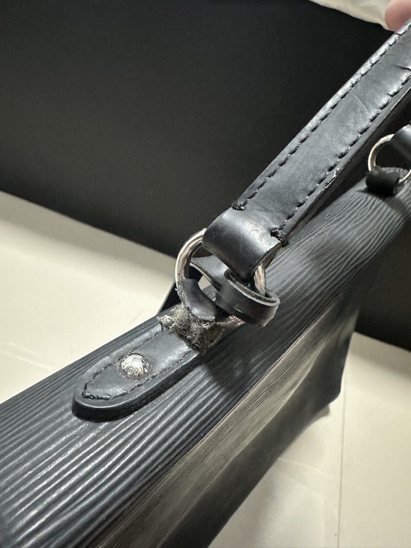 Vintage Louis Vuitton Handbag (Category: Laptop Bags & Sleeves) located in Manila. Submitted by mae__________c (Listing ID 1459786385, Image 3). Description: Slight leather issue on the handle (seen on the picture) Declutter Sta ana manila Not sure if authentic but complete brand tags and embossed tags on zipper, inside lining and outside design. .