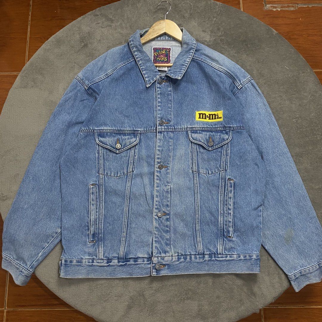 Vintage M&M's Planet Mars Denim Jacket XL (Category: Coats, Jackets and Outerwear) located in Naga. Submitted by ejdurante17 (Listing ID 1459744539, Image 1). Description: - Cool vintage M&M's denim jacket - From Planet Mars collection - Features M&M characters graphic on the back - Small M&M logo on the front chest pocket - Size XL / TG - A must-have for any M&M enthusiast! - just light stain sa sleeve & lining sa collar due to vintage + Shippin