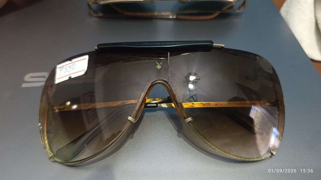 Vintage Playboy Aviator Sunglasses (Category: Sunglasses & Eyewear) located in Quezon City. Submitted by manyigorot33447 (Listing ID 1459851696, Image 1). Description: - Vintage Playboy aviator sunglasses - Gradient brown lenses - Gold frame - Clear nose pads - Some signs of wear on frame (expected for vintage) - Stylish for sunny days - Price: P550 DAMAGE AS IS WER IS FOR COLLETION ONLY .