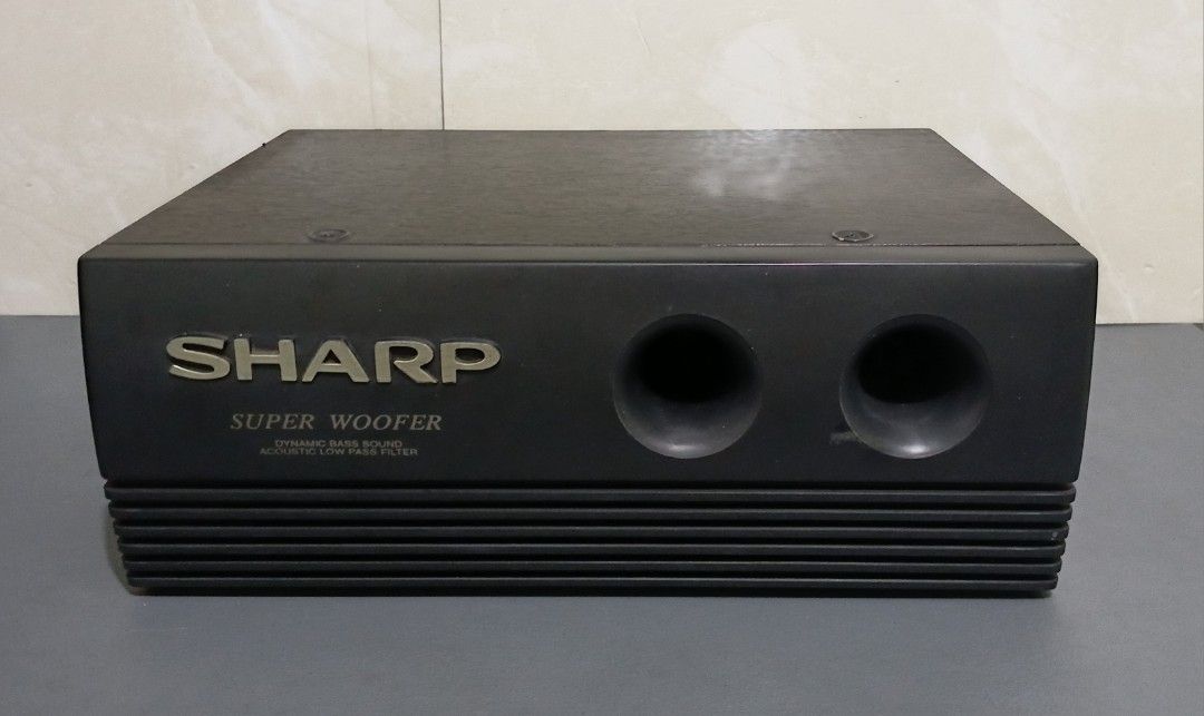 Vintage Sharp AN-SW2400 Passive Subwoofer Speaker (Untested) (Category: Soundbars, Speakers & Amplifiers) located in Bulacan. Submitted by honhonliz (Listing ID 1459795185, Image 1). Description: Condition Untested / As-Is: Item has not been hooked up to an amplifier or tested for functionality due to a lack of compatible equipment. Cosmetic Appearance: Well-used vintage condition with visible signs of age. There are light surface scratches and t