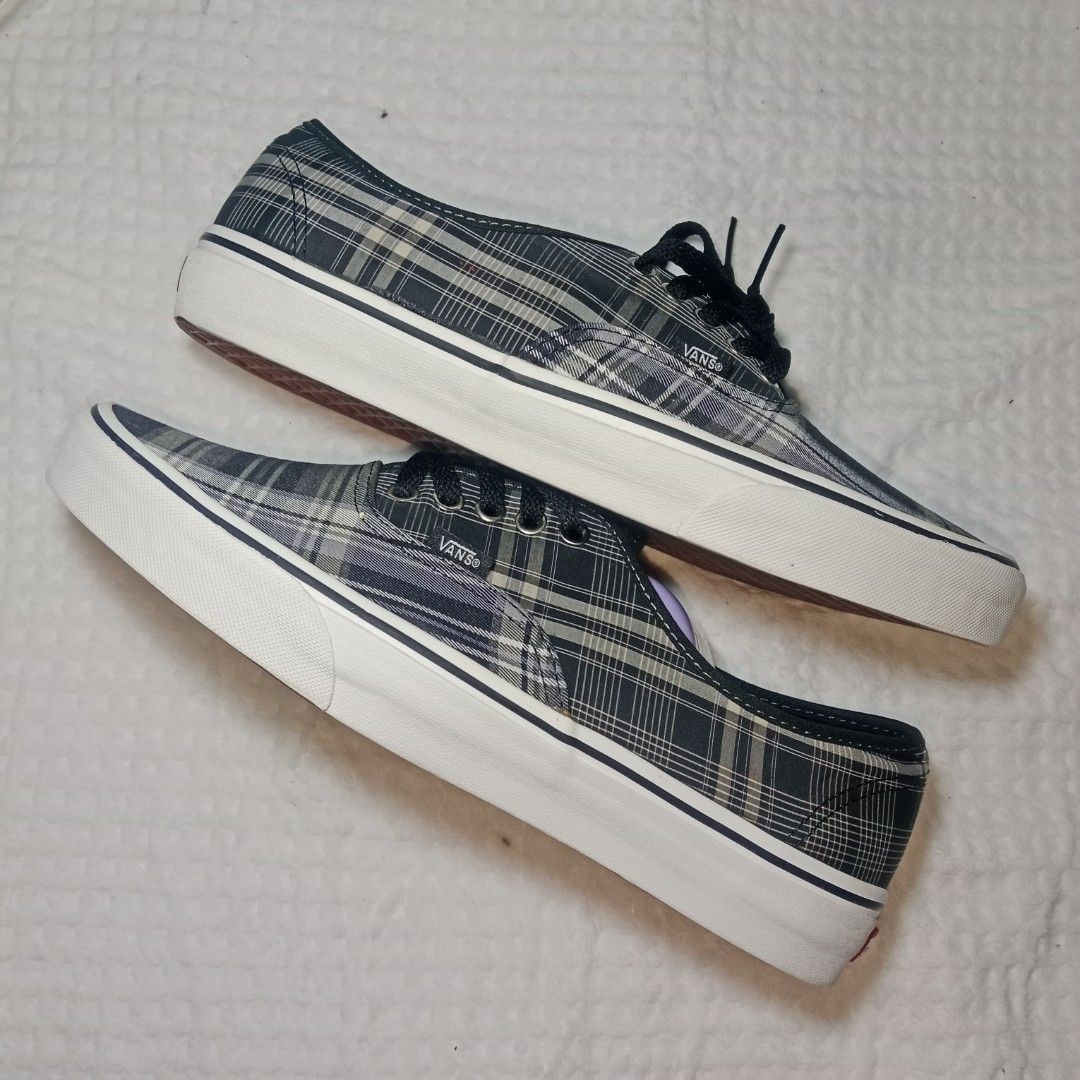 Vintage Vans Authentic Plaid Mule Sneakers (Category: Sneakers) located in Mabitac. Submitted by kitothrifty (Listing ID 1459838099, Image 2). Description: - Cool Vans plaid mules - Easy slip-on style - Plaid pattern: grey, white, dark blue tones - Black laces and white soles - Great for casual wear - Fun twist on classic Vans look.