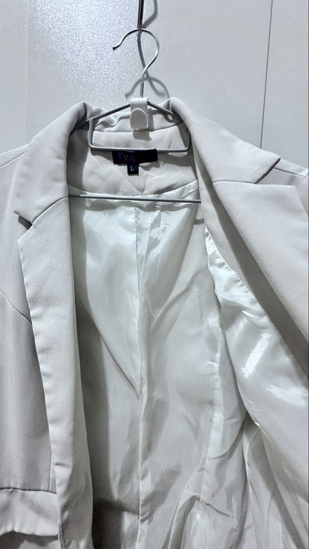 VIVANT BLAZER - Light Grey + 1 free item ❗️Read description (Category: Others Tops) located in Manila. Submitted by herr.boutiqu3.2 (Listing ID 1459797077, Image 2). Description: ❗️BUY 1 of the items FOR SALE to get 1 of the free items. Visit profile for both available items for sale and for free. ❗️❗️Note: Measurements when laid flat ❗️❗️Blazer and Pants SOLD SEPARATELY VIVANT BLAZER Shoulder - 38cm Bust - 45 cm Waist - 42cm Length - 60cm VIVANT