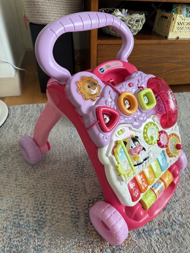VTech First Steps Baby Walker Pink (Category: Infant Playtime) located in Taguig. Submitted by cloudclosetandhome (Listing ID 1459703711, Image 2). Description: VTech First Steps Baby Walker Pink 📍 One Serendra BGC LIKE NEW. NO ISSUES. COMPLETE PARTS. RFS: Moving out Used for 3 months only. No more box. What you see is what you get. 💵 MOP: Gcash, BPI, Secbank, or UB 🛵Booking c/o BUYER (SDD via Grab, lalamove); ✅Pay before you book to avoid iss