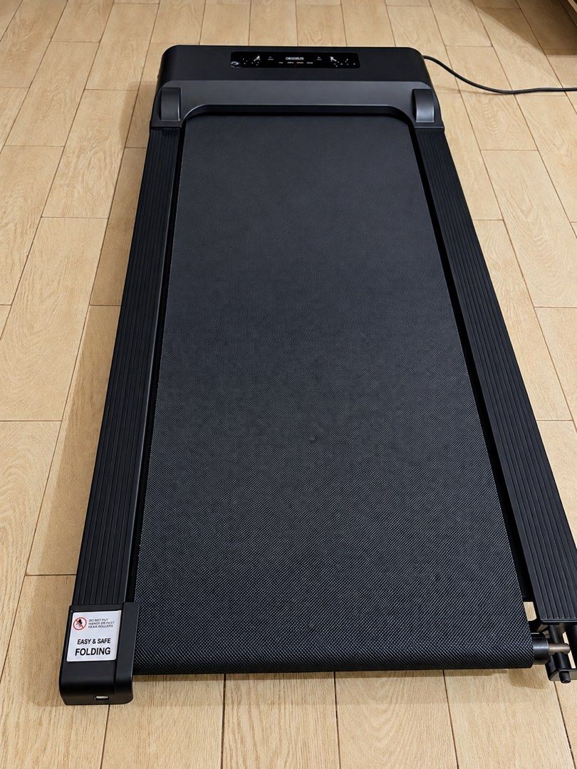 Walkpad with remote control (Category: Cardio & Fitness Machines) located in Quezon City. Submitted by jfr22 (Listing ID 1459861981, Image 1). Description: Used less than 10 times. Selling for less than half SRP. Fully functional. Only issue is chipped plastic on right (seen on picture) No brand, not xiaomi Does not incline.