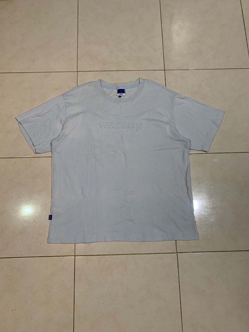 Wassup Embossed Shirt (Category: Tshirts & Polo Shirts ) located in Dipolog. Submitted by ethrifttt (Listing ID 1459870894, Image 1). Description: Wassup Embossed Shirt 23.5 width x 27.5 length excellent condition, no issue.