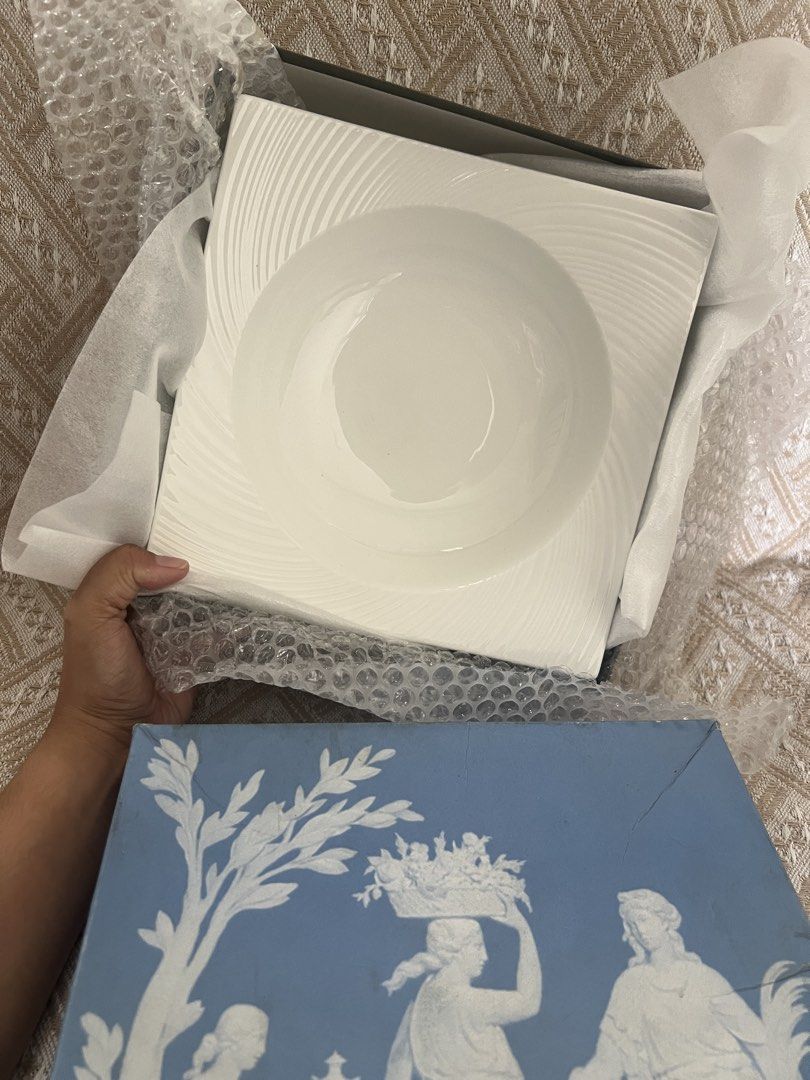 Wedgwood Ethos Square Serving Bowl White (Category: Dinnerware & Cutlery) located in Cainta. Submitted by astalabista11 (Listing ID 1459709146, Image 3). Description: - Wedgwood Ethos serving bowl - Elegant white porcelain - Unique square design with a circular inner bowl - Subtle textured pattern on the rim - Comes in original box with protective packaging -bought in Japan .