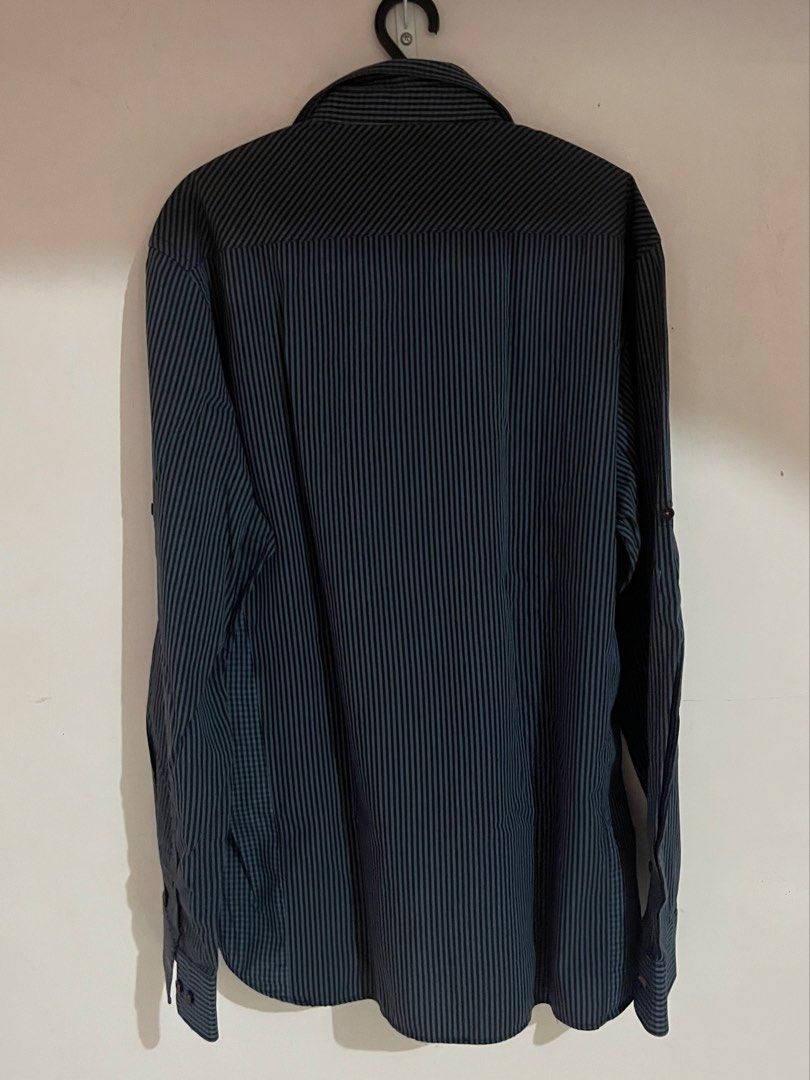 Wharton Long Sleeve Button-Down Shirt (Black/Grey Stripe & Check) (Category: Formal Shirts) located in Gapan. Submitted by ar_armey (Listing ID 1459823974, Image 3). Description: Brand: Wharton Color: Black and Grey Striped with Contrast Check Panel, Orange Stitch Accents Size: Tagged XL Condition: Good quality, no flaws Details: Long sleeves with roll-up tab straps, mixed stripe and gingham check panel design, front button closure with orange co