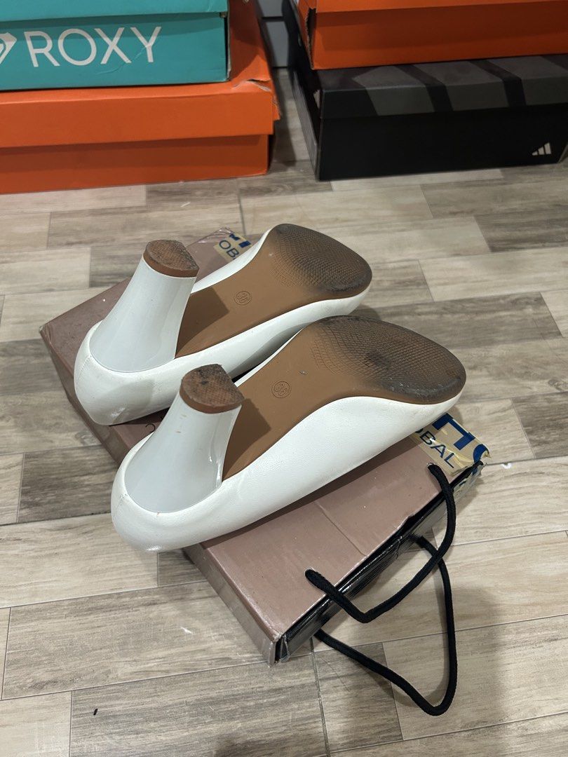 White Block Heels - SM Parisian (Category: Heels) located in Caloocan City. Submitted by purpuracaelum (Listing ID 1459900041, Image 2). Description: - Classic white block heels - Chunky heel for stability - Minor scuffs on toe area - Ideal for work or special occasions.