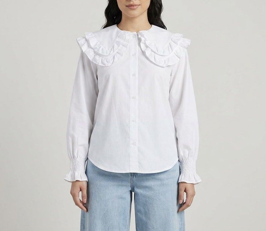 White Double Ruffle Collar Shirt Longsleeve (Category: Shirts) located in Caloocan City. Submitted by declutteringph. (Listing ID 1459729564, Image 1). Description: No Size on the tag! Measurements: (inches) shoulder: 18” pit to pit: 21” length: 22.5” - 27” sleeve length: 23.5”.