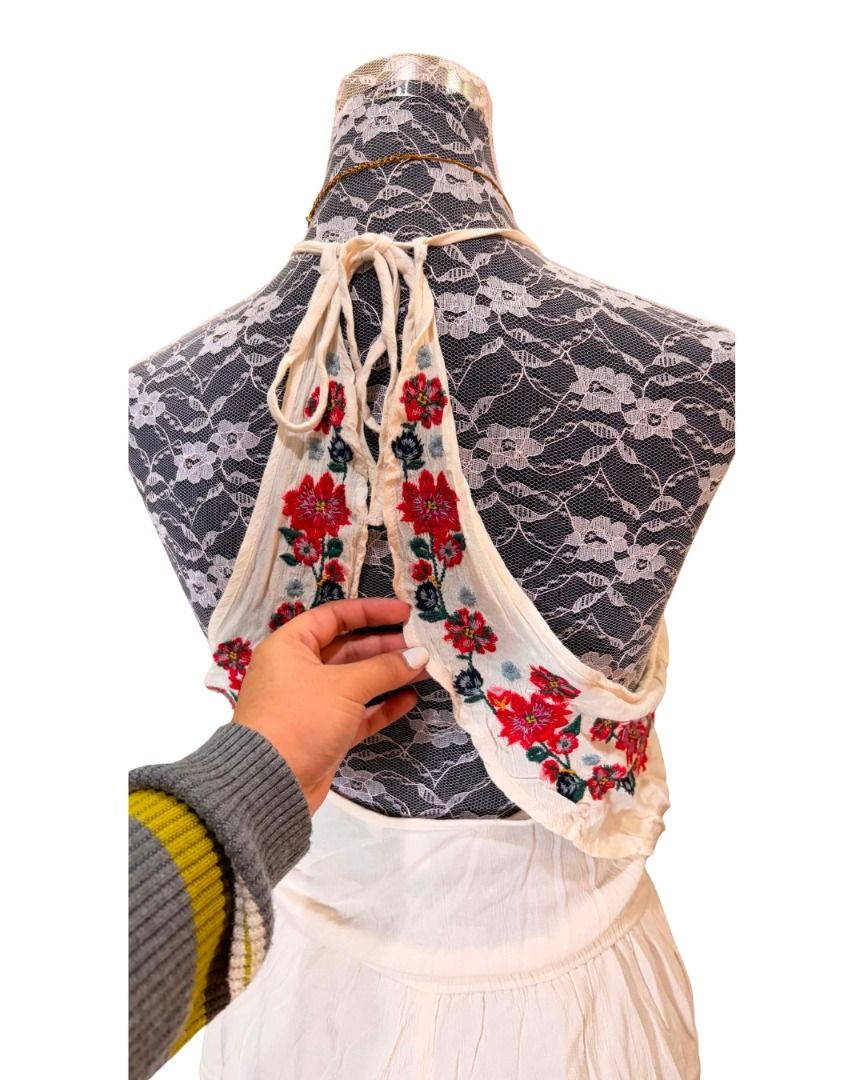 White Embroidered Halter Neck Romper with Tassels (Category: Rompers) located in Baguio. Submitted by ellamell (Listing ID 1459774440, Image 2). Description: Best fits XS-S 40cm bust 30-40cm waist 79cm length/height - White halter neck romper - Garterized waist - Beautiful floral embroidery on top and hem - Drawstring waist with tassel detail - Adjustable back ties - Lightweight and flowy material - Ideal for beach days or casual outings.
