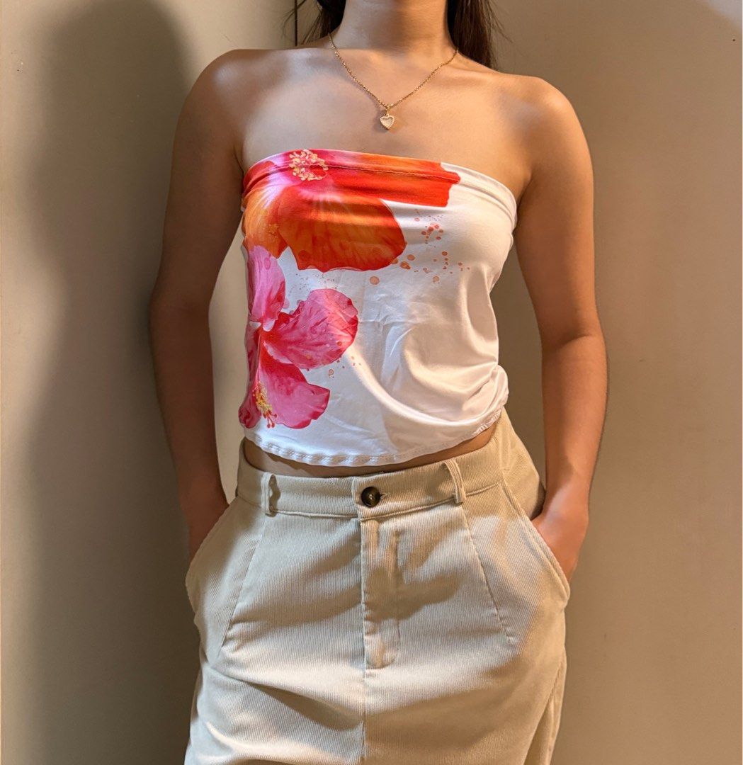 White Floral Tube Top (Category: Sleeveless) located in San Antonio. Submitted by decluttermemine (Listing ID 1459793183, Image 1). Description: MOP: BPI and GCASH only lalamove/gogo express carried by buyer .