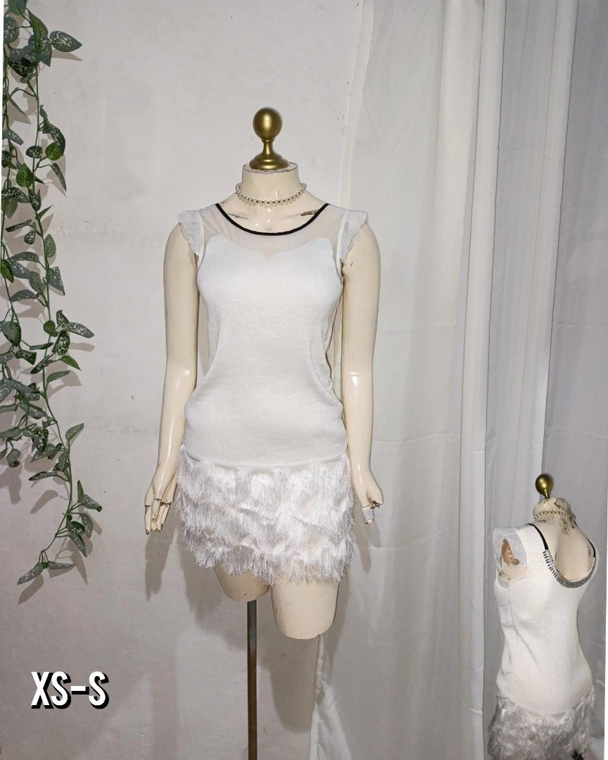 white fur elegant mini dress (Category: Dresses) located in Pateros City. Submitted by amj_amj (Listing ID 1459840101, Image 1). Description: .