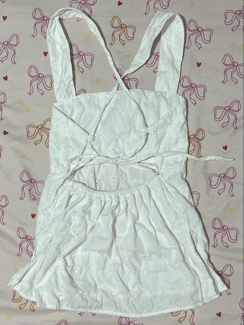 White halter eyelet top (Category: Blouses) located in Daet. Submitted by 614cb (Listing ID 1459718857, Image 2). Description: Bought in black app live selling from nkd shop Never been used Rfs: been wfh and seldom goes out and enjoying it. Pls give my stuff a new home. .