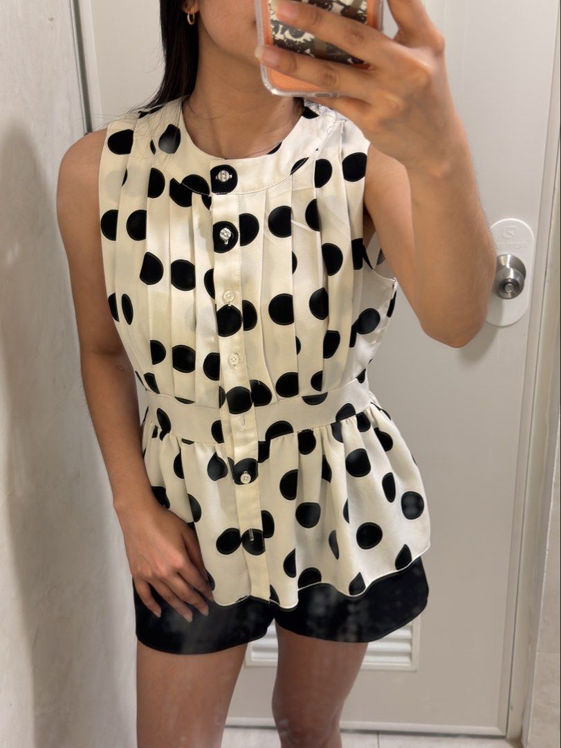 White Polka Dot Sleeveless Peplum Top (Category: Sleeveless) located in Makati City. Submitted by biotch (Listing ID 1459804929, Image 1). Description: can fit to xs to medium only flaw is its missing one button in the middle can do lalamove same day deliver or j&t asymmetrical Cotton on Nike new balance asics adidas Lululemon bershka skims sports leggings sportsbra H&M bershka corporate skirt skort zara pomelo thrift baggy jeans wide leg denim c