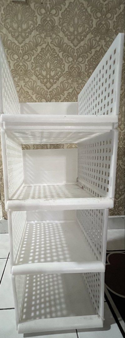 White Stackable Storage Shelf Unit (Category: Shelves, Cabinets & Racks) located in Petaling Jaya. Submitted by minimising (Listing ID 1459717315, Image 3). Description: - Set of 4 white modular storage shelves - Stackable - Perfect for organizing clothes, toys, and household items - Well used, not very sturdy but suitabable for light items - Bought few years back .