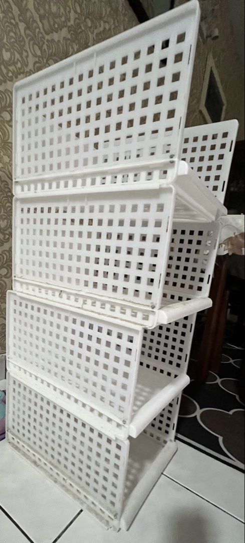 White Stackable Storage Shelf Unit (Category: Shelves, Cabinets & Racks) located in Petaling Jaya. Submitted by minimising (Listing ID 1459717315, Image 2). Description: - Set of 4 white modular storage shelves - Stackable - Perfect for organizing clothes, toys, and household items - Well used, not very sturdy but suitabable for light items - Bought few years back .
