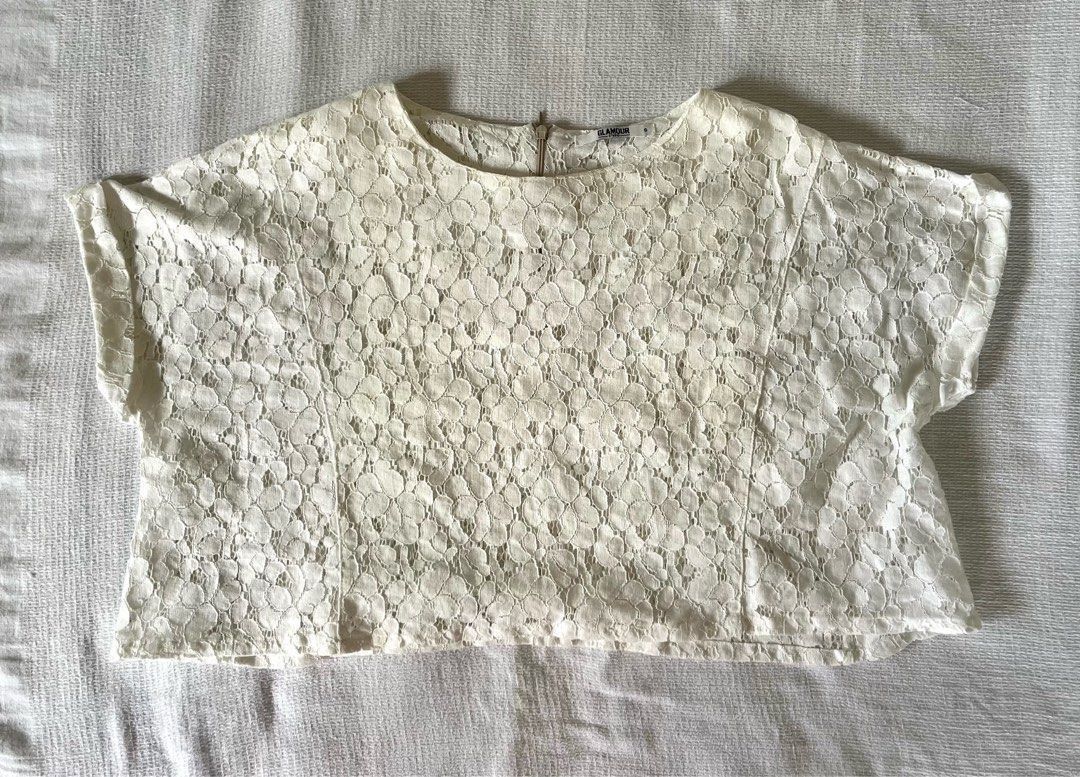 White Summer Lace Top (Category: Blouses) located in Caloocan City. Submitted by fishfilei (Listing ID 1459787923, Image 1). Description: Details: • Perfect for summer outfits • Easy to pair with skirts or pants • See-through white lace top • Cropped style • For reference: I have a 23-inch waist and 32-inch bust. This is designed to have a naturally loose fit and can fit up to a medium frame. Mode of Payment (MOP): • GCash • BDO / BPI / Metrobank