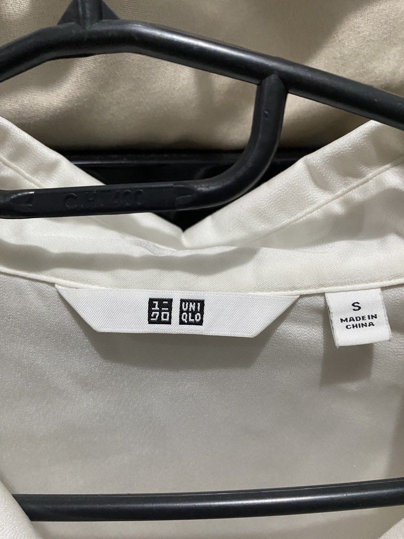 White Uniqlo polo (Category: Longsleeves) located in Manila. Submitted by kate________ (Listing ID 1459810994, Image 2). Description: .