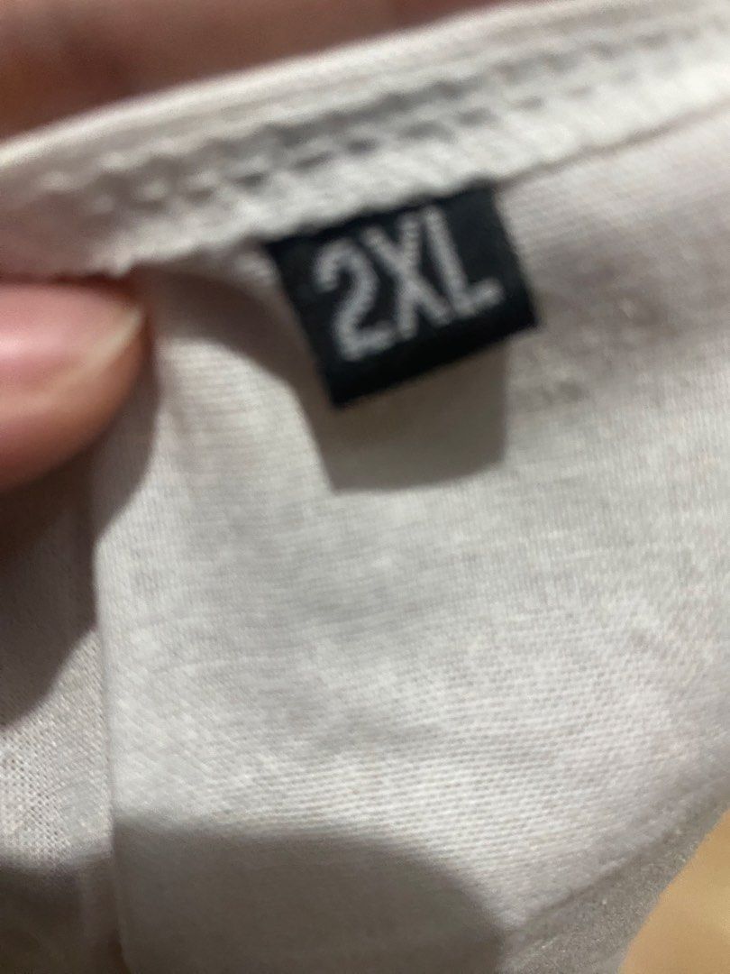 White v neck with ties (Category: Sleeveless) located in Caloocan City. Submitted by d3clutt3r1ng (Listing ID 1459747679, Image 3). Description: - never used, tried on only, washed already - have to wear pasties with this, v neck is too deep to wear strapless bra (will show) - too big and low for me - presko.