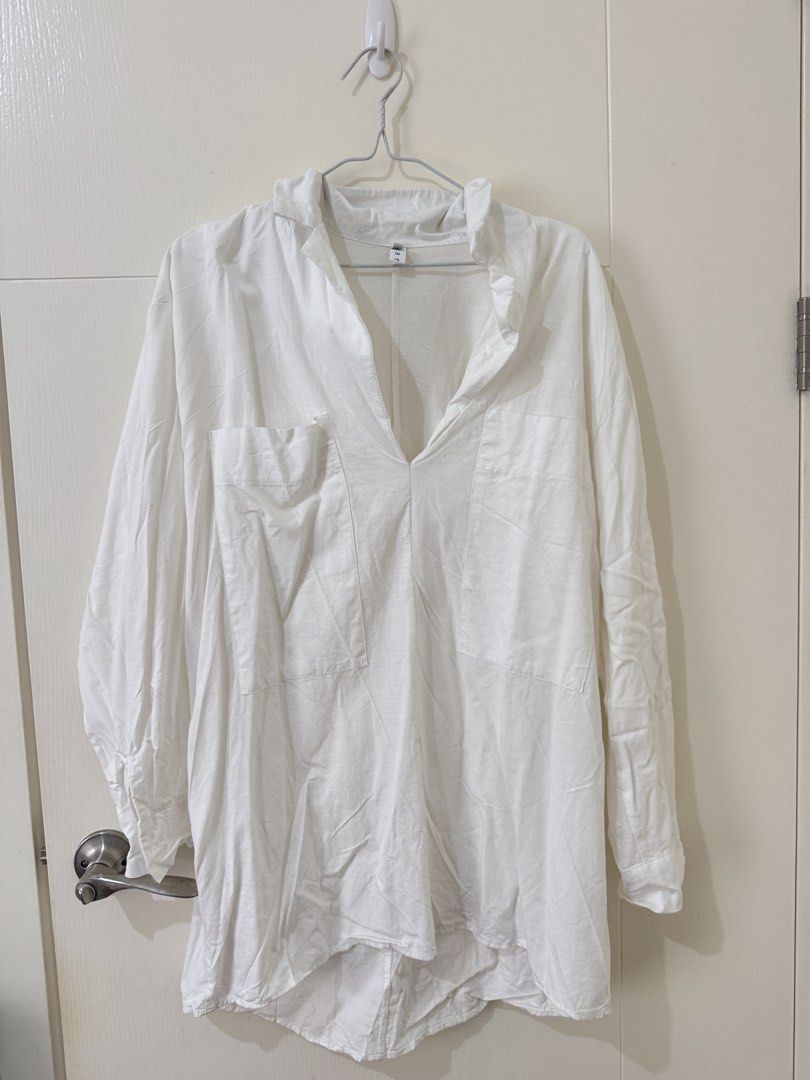 White V-neck Long Sleeve Shirt (Category: Shirts) located in Mandaluyong City. Submitted by trinket.ph (Listing ID 1459734789, Image 1). Description: - White long sleeve shirt - V-neckline - Two chest pockets - Linen or linen blend fabric - Relaxed fit - Perfect for casual wear - Easy to style.