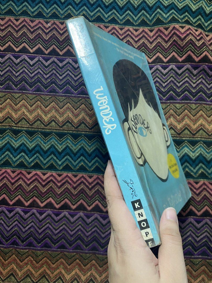 Wonder by R.J. Palacio (Category: Storybooks) located in Makati City. Submitted by k.sainz (Listing ID 1459779029, Image 2). Description: - Wonder by R.J. Palacio - A beautiful, funny, and sometimes sad story - Yellowing of pages and signs of usage on the front cover. .