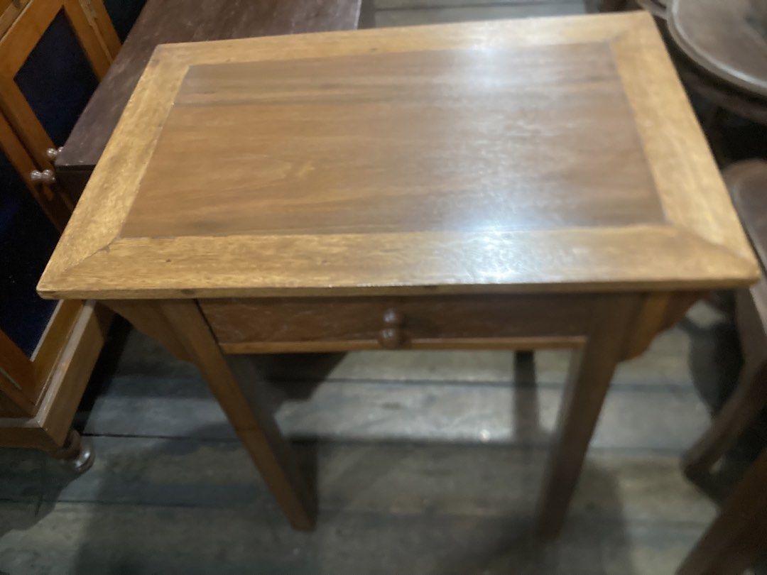 Wooden Side Table with Drawer (Category: Tables & Sets) located in Manila. Submitted by roberto.enriquez (Listing ID 1423255590, Image 3). Description: - Wooden side table - Single drawer with round wooden knob - Rectangular tabletop with raised border - Supported by four legs - Natural wood finish - Classic design Length 28 Width 18 inches Height 30.