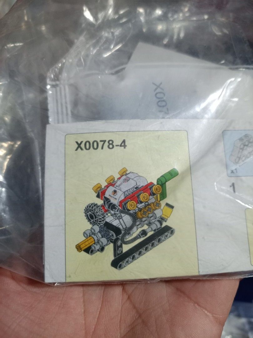 X0078-1 & X0078-4 Building Blocks Engine Model Toy (Category: Lego & Building Sets) located in Manila. Submitted by warmcrystal_269010 (Listing ID 1459730267, Image 3). Description: - Two engine model building block sets: X0078-1 and X0078-4. - Pieces are sealed in original plastic bags. - Assembly instructions are included. - Ideal for building enthusiasts and a fun project to assemble. 250 each.