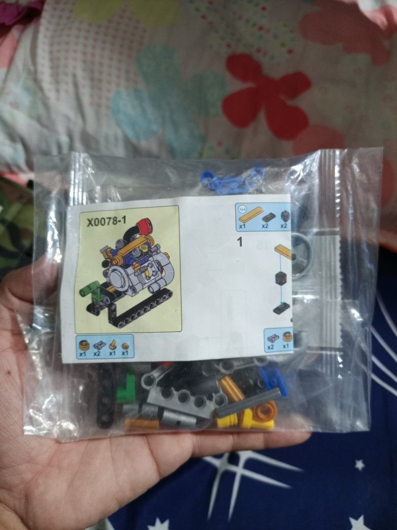 X0078-1 & X0078-4 Building Blocks Engine Model Toy (Category: Lego & Building Sets) located in Manila. Submitted by warmcrystal_269010 (Listing ID 1459730267, Image 2). Description: - Two engine model building block sets: X0078-1 and X0078-4. - Pieces are sealed in original plastic bags. - Assembly instructions are included. - Ideal for building enthusiasts and a fun project to assemble. 250 each.