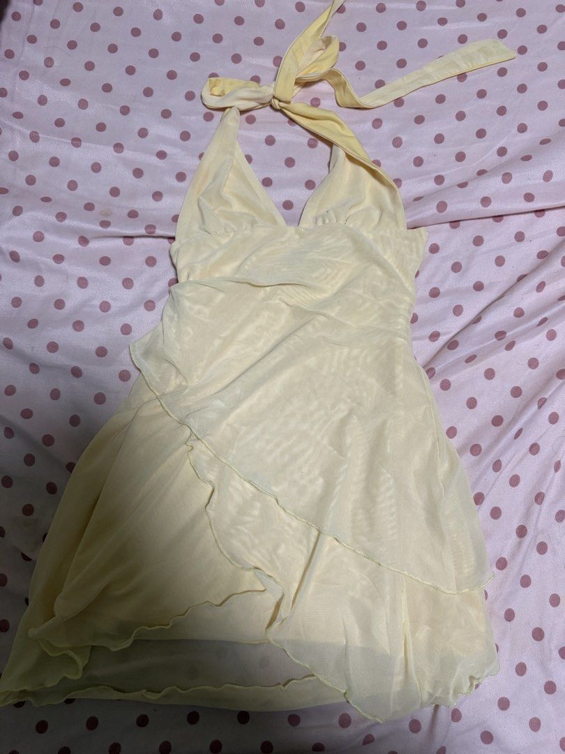 Yellow halter mesh mini dress (Category: Dresses) located in Quezon City. Submitted by buhbyestuff (Listing ID 1459689847, Image 1). Description: Used once.