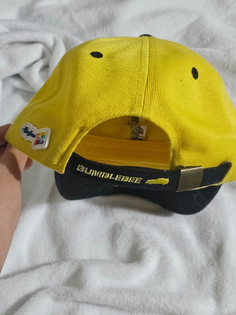 Yellow Transformers Bumblebee Cap (Category: Caps & Hats) located in Makati City. Submitted by bmt_27 (Listing ID 1459840000, Image 2). Description: - like new! - fits adults - metal transformers emblem - the yellow is vibrant pa, no fabric fading, no rusting - honest issue: cut up back part of the emblem, i already bought it like that pala :( (see last photo) RFS: decluttering 🫧 MOP: gcash/instapay 🫧 MOD: sdd (grab/lalamove).