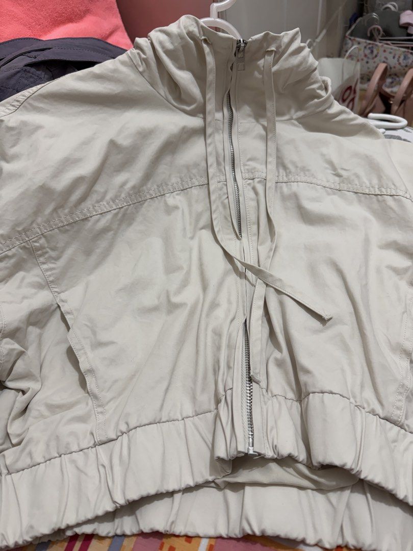 Zara: Cropped Hooded Jacket Beige (Category: Coats, Jackets and Outerwear) located in Quezon City. Submitted by belleg724 (Listing ID 1459787523, Image 3). Description: - Lightweight cropped jacket from ZARA - Color: Beige - Hooded design with full zip closure - Elasticated hem and cuffs for a snug fit - Two convenient front pockets - Ideal for layering or as a light outerwear piece - Size: XL.
