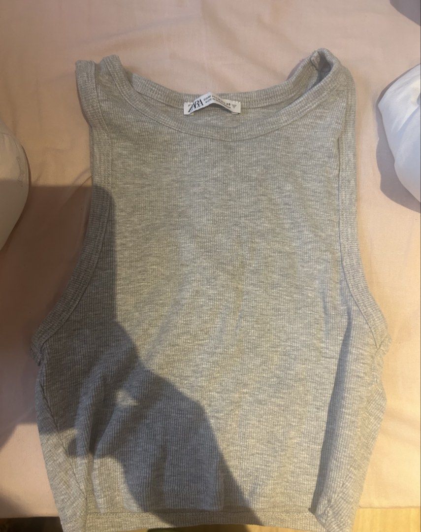Zara grey tank top (Category: Sleeveless) located in Manila. Submitted by coquettecosette (Listing ID 1459729091, Image 1). Description: ୨୧ ˚₊‧ Grey Zara tank top ‧₊˚ ୨୧ ♡ Size: Medium ♡ Soft grey color ♡ Simple + feminine fit ♡ Easy to style with skirts, jeans, or low-rise bottoms ♡ Perfect for a cute coquette / ballet-inspired look 🎀🩰 𐙚 Great for everyday wear or layering ♡.