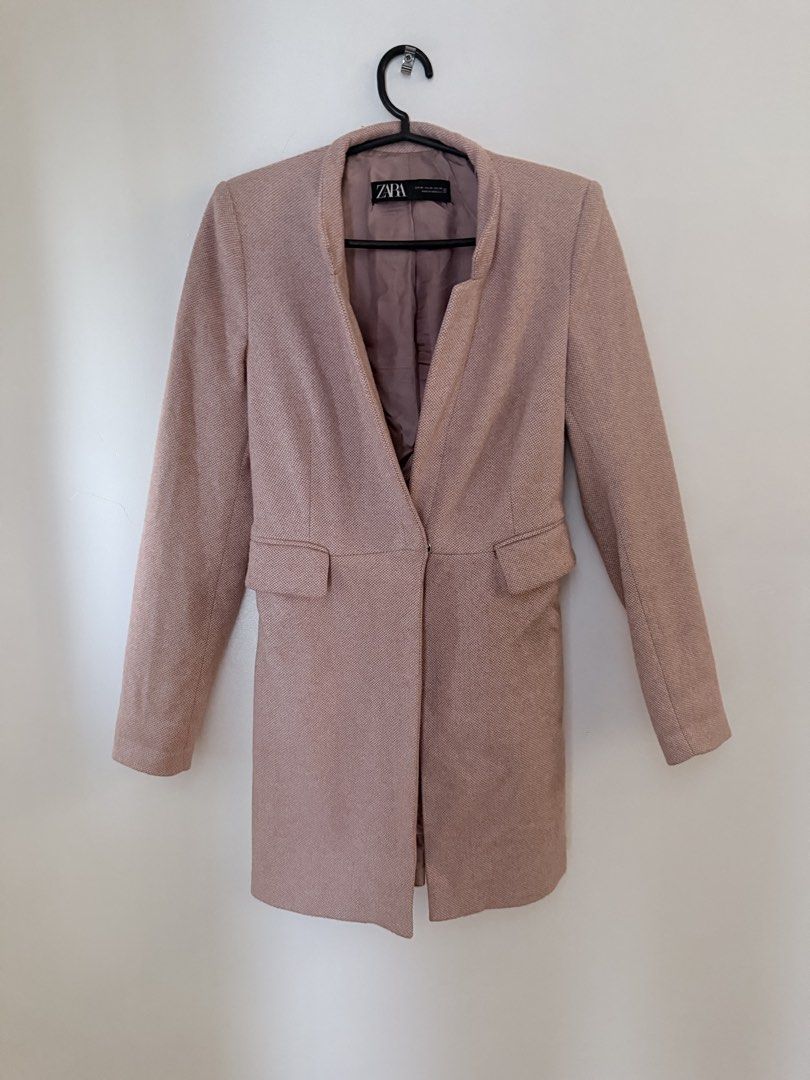 Zara Pink Textured Collarless Coat (Category: Coats, Jackets and Outerwear) located in Manila. Submitted by amormiaa (Listing ID 1459728714, Image 2). Description: - Zara coat in a lovely textured pink fabric. - Collarless design with a V-neck opening. - Two front flap pockets. - Fully lined interior. - Great for layering over outfits. - Versatile piece for your wardrobe..