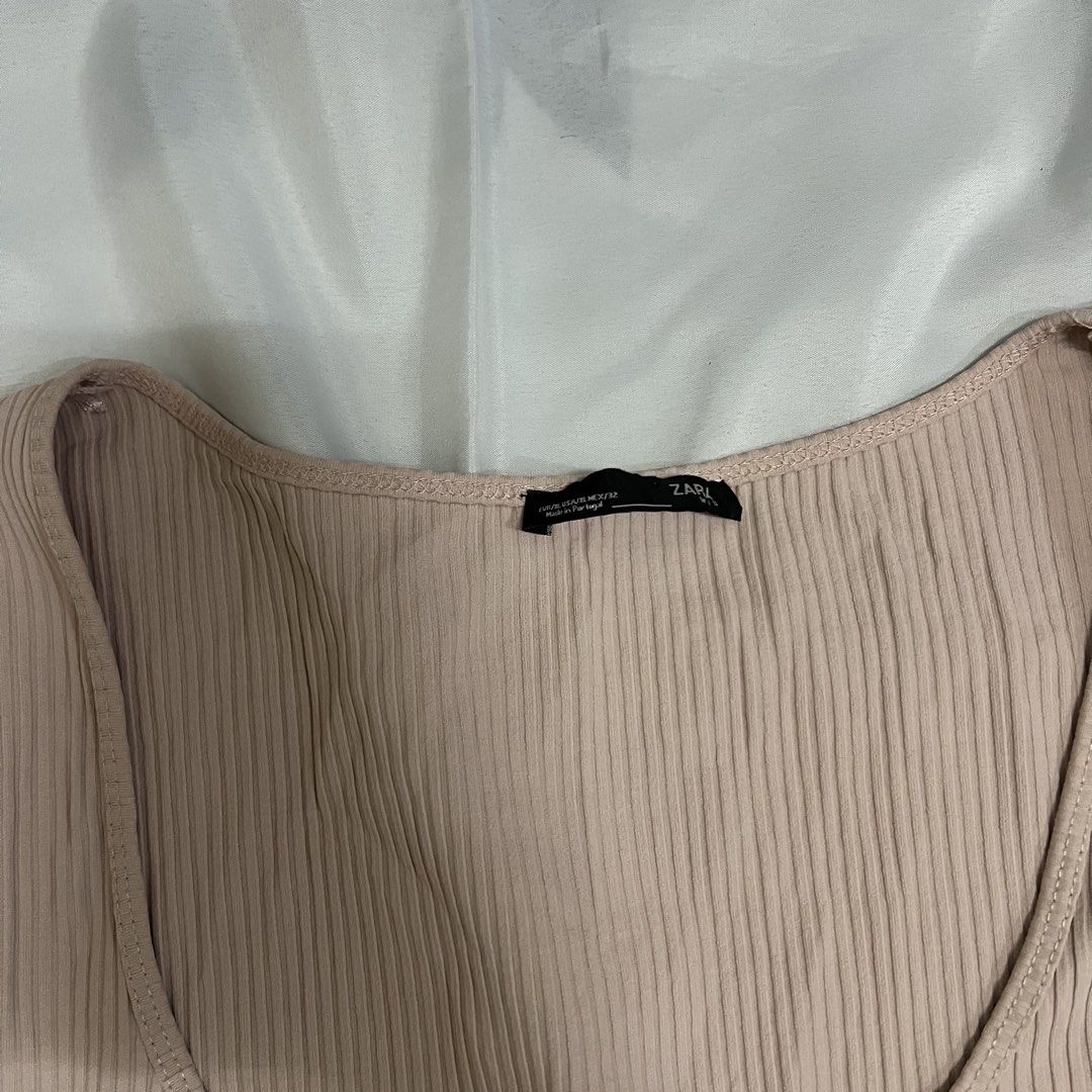 Zara Ribbed Square Neck Top (Category: Sleeveless) located in Imus. Submitted by niftees.eco (Listing ID 1459709019, Image 2). Description: Zara ribbed top. Light pink. Square neck. Short sleeves. Stretchy fit. Basic. Large on tag! .