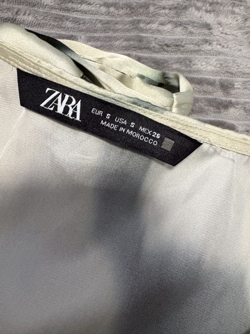 Zara Tie Dye Wrap Top Size S (Category: Blouses) located in San Pedro. Submitted by princessjybc (Listing ID 1459807872, Image 3). Description: FOR SALE: Zara Tie Dye Silk Top ✨ Size: Small — True to size (Square on Tag) ✨ Condition: Lightly used ✨Silk 📸 May request for actual photos and measurements. Just send me a message! 📍 Location: San Pedro, Laguna.