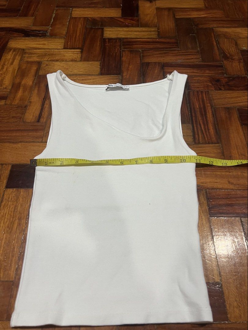 Zara White Asymmetrical Tank (Category: Others Tops) located in Quezon City. Submitted by chloe_declutter (Listing ID 1459771497, Image 3). Description: Open to pickup/j&t delivery Cubao QC location Still available 9/26 Code: Teal Box.