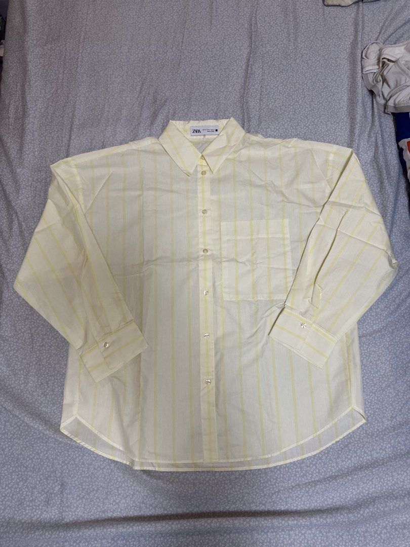 Zara Yellow Striped Longsleeve Blouse (Category: Blouses) located in Quezon City. Submitted by brownieslover123 (Listing ID 1459876384, Image 1). Description: - never used (but i removed the tag) - yellow striped blouse - zara 💕💕💕.