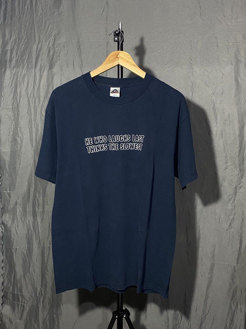 00’s Statement Tee (Category: Tshirts & Polo Shirts ) located in Calauan. Submitted by thriftsy.fingers (Listing ID 1460096009, Image 1). Description: 2000’s Statement Tee - Triple A Tag - Large - 21.5 x 29.5 - No issue.