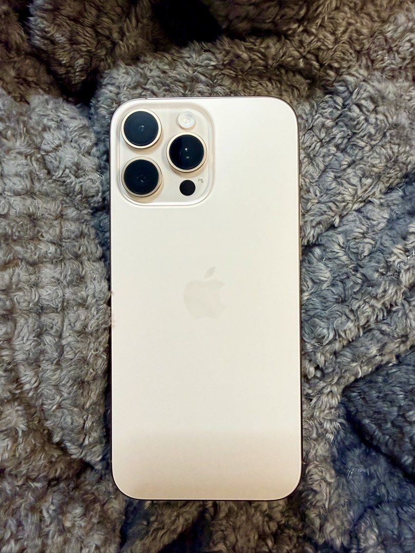 16 pro max 256gb Desert Titanium (Category: iPhone 16 Series) located in Quezon City. Submitted by zaburnx (Listing ID 1459969126, Image 2). Description: Desert Titanium - 256gb storage - factory unlocked - face id working - truetone working - 89% bh (orig batt) - no history of repair - iOS 26.6 -no visible signs of usage - Comes with 3rd party cable and box only. Negotiable Meet up only, cash..
