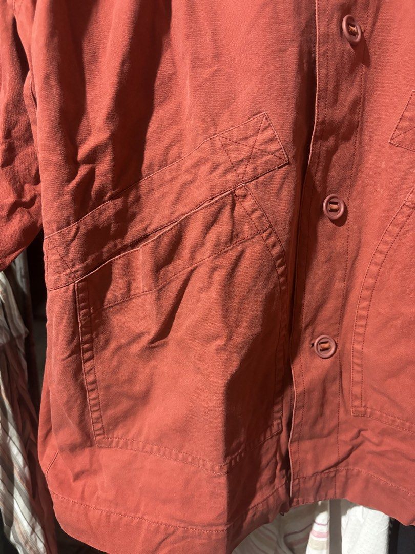 1980s Archival Issey Miyake Red Button-Up jacket (Category: Coats, Jackets and Outerwear) located in Manila. Submitted by why_notph (Listing ID 1460100839, Image 3). Description: - Red jacket from MIYAKE DESIGN STUDIO - Features a stylish mandarin collar - Button-up front closure - Three functional pockets: two large front pockets and one smaller chest pocket - Elasticated cuffs with button detail for a snug fit - Made from durable fabric - Versa
