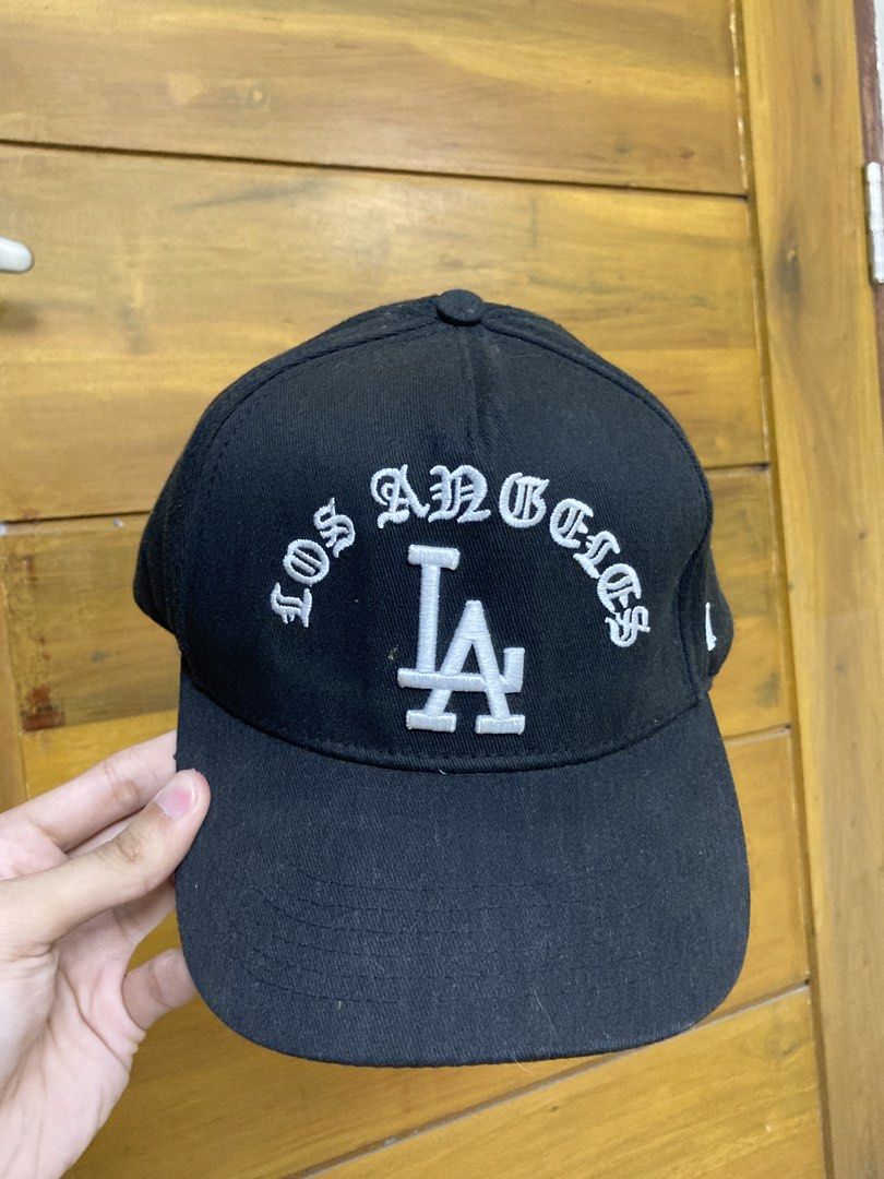 ₱10 + Shipping Fee (Category: Caps & Hats) located in Batangas. Submitted by declutteringvon (Listing ID 1460006123, Image 1). Description: - Black 47 Brand cap - Features embroidered LA Dodgers logo on front - 'Los Angeles' text above logo - '47' logo on the side - Adjustable strap at the back - Ideal for Los Angeles Dodgers fans.