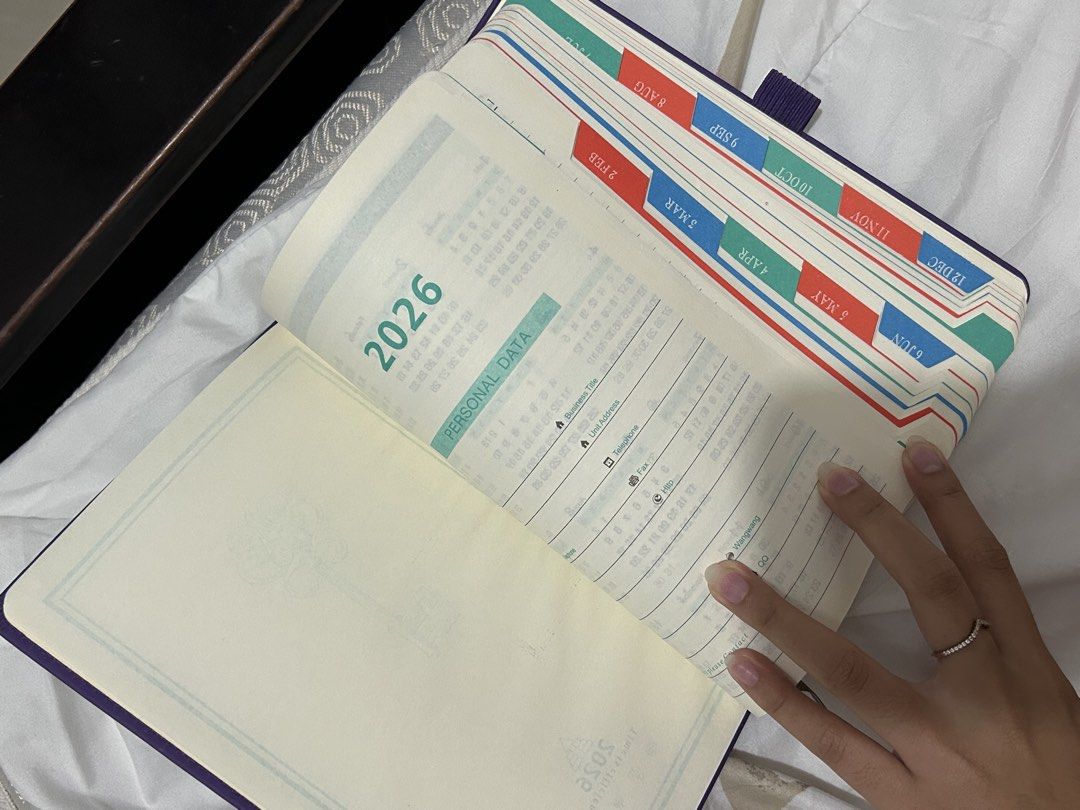 2026 Purple Planner (Category: Stationery & School Supplies) located in Pasay City. Submitted by haxiea (Listing ID 1460086180, Image 2). Description: Never used, walang sulat kahit isa. sayang baka mahabol niyo at magamit pa - 2026 Purple Planner - Features Monthly Views - Month tabs for easy navigation - Ideal for year-long organization.