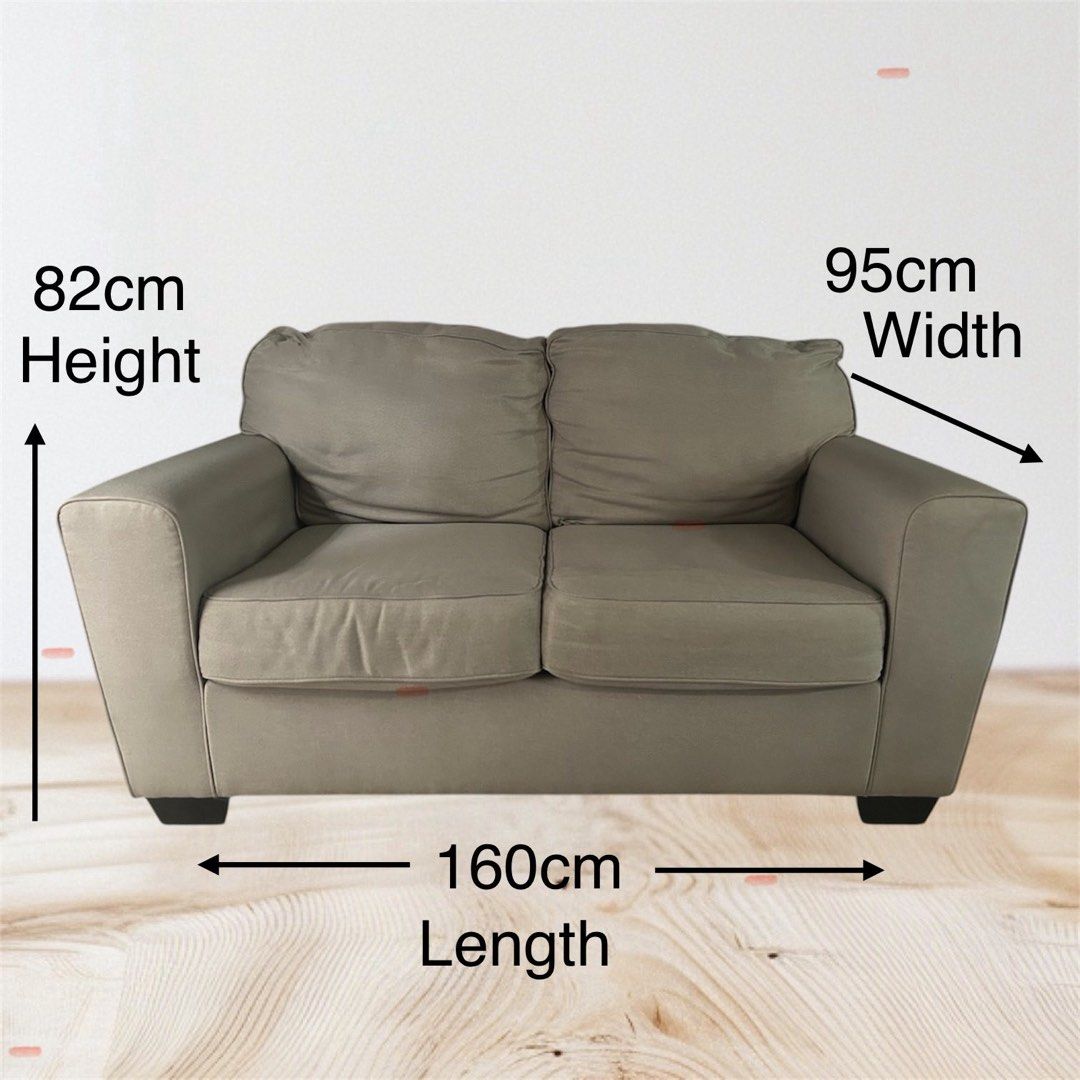 2-seater light grey sofa (Category: Sofas) located in Paranaque City. Submitted by markmywords77 (Listing ID 1460049329, Image 1). Description: - Sofa Ashley brand, great condition - Light grey 2-seater sofa - Comfortable cushions - Dimensions: 160cm (L) x 95cm (W) x 82cm (H) - Ideal for apartments or smaller living spaces.