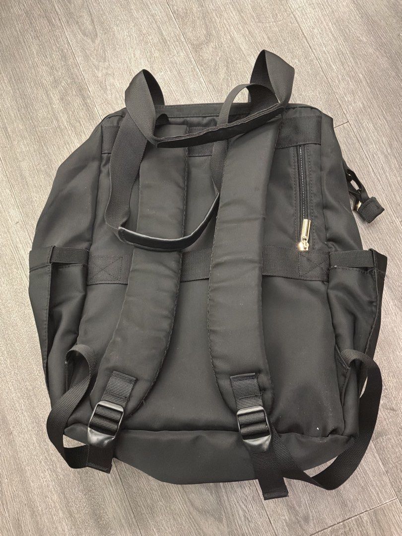 2-Way Laptop Bag (Unbranded, Multi-Compartments) (Category: Tote Bags) located in Marikina City. Submitted by glimmr.ph (Listing ID 1460003948, Image 2). Description: Used once. Leather is not cracked but with dents. Bought in Japan. Has up to 10 pockets: - Laptop compartment - Internal zipper pocket - 3 small pockets inside - Zip pocket outside - Clasp pocket outside - Secret pocket at the back - 2 side pockets for umbrellas or tumblers.