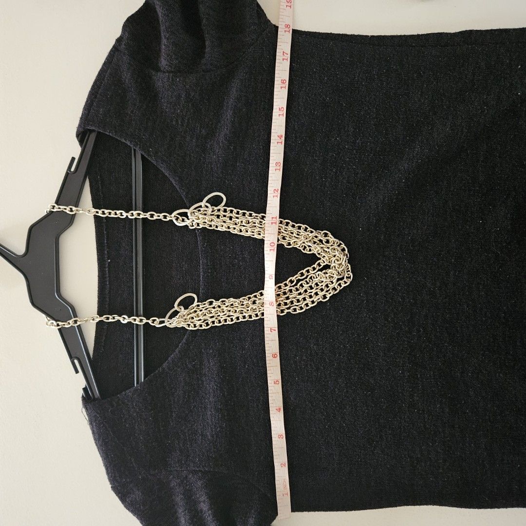 56. Black Long Sleeve Sweater Free Size (Category: Longsleeves) located in San Juan City. Submitted by titaofmanilaessentials (Listing ID 1459998084, Image 3). Description: - Dark grey long sleeve sweater - Unique silver chain detail around the neckline - Soft knit material - Great for layering or wearing on its own - Versatile wardrobe piece - Used once for US trip.