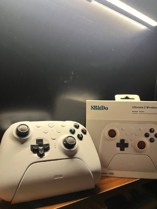 8BitDo Ultimate 2 Wireless Controller (Category: Controllers) located in Petaling Jaya. Submitted by zubi.tcg (Listing ID 1460035646, Image 1). Description: - White 8BitDo Ultimate 2 wireless controller - Compatible with Windows and Android - Connects via Bluetooth or USB - Comes with charging dock - Ideal for gaming on multiple devices - Able to negotiate - Feel free to ask any questions!.