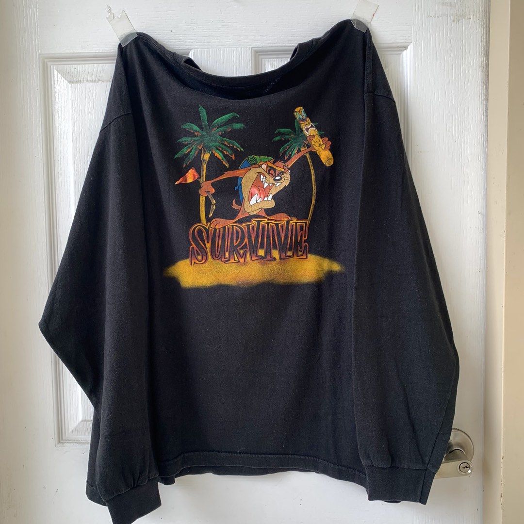 90’S TAZMANIAN DEVIL ‘SURVIVOR’ (Category: Tshirts & Polo Shirts ) located in Plaridel. Submitted by sonofthe.dawgg (Listing ID 1460001008, Image 2). Description: - 26 x 27 MEASUREMENT (BOXY XL) - MISSING LOONEY TUNES TAG - LOOSE STITCHING.