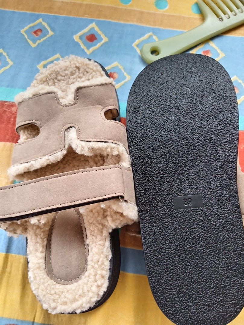 🩴 Cozy Fuzzy Two-Strap Slides — Size 39 (Category: Flats & Sandals) located in Davao. Submitted by mizzycat62 (Listing ID 1459975545, Image 2). Description: - Beige sandals with a super soft fluffy lining. - Features an adjustable strap at the front for a secure fit. - Stylish thick black sole for comfort and durability. - Size 39. - Ideal for everyday casual wear..