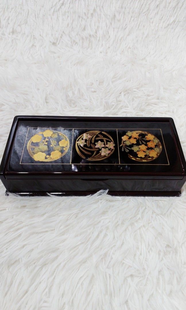 🌸 Japanese Lacquered Decorative Keepsake Box (Category: Accessory Holder, Box & Organizers) located in Binan City. Submitted by sakuratreasuresph (Listing ID 1459994252, Image 3). Description: 🌸 Japanese Lacquered Decorative Keepsake Box A beautiful statement piece with timeless Japanese-inspired artistry. ✨ 🖤 Glossy deep burgundy-black lacquer finish 🌼 Intricate gold floral artwork on the lid 🎎 Spacious lined interior for keeping precious t