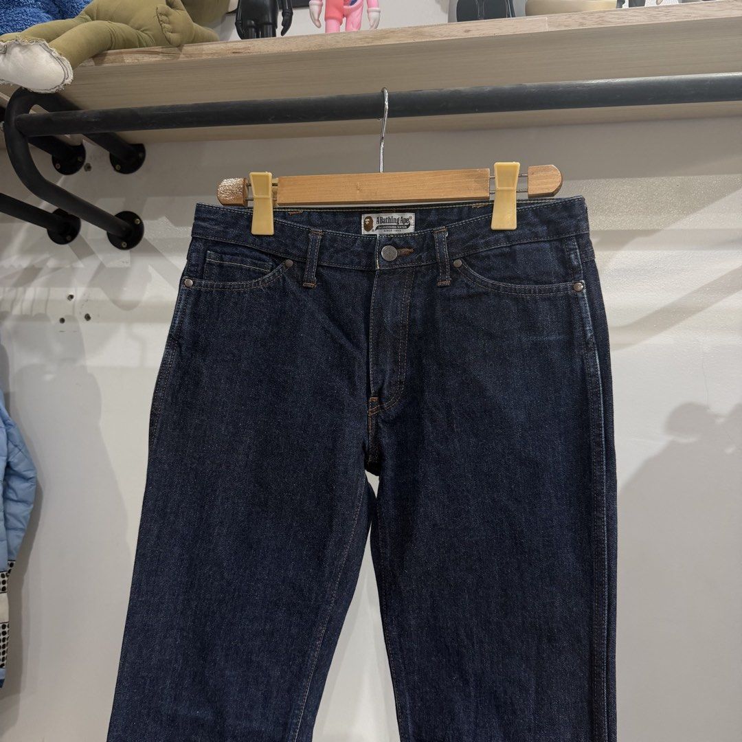 A Bathing Ape Straight Leg jeans (Category: Jeans) located in Bambang. Submitted by heats777 (Listing ID 1460083091, Image 1). Description: Excellent condition Minimal hairlines on design to be safe Featuring a dark blue color and design on back Size: XS can fit to Mens Small.